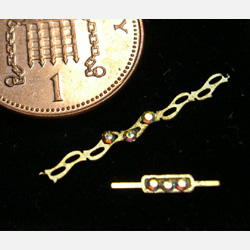 Swarovski crystals in a tiny Bracelet and Brooch